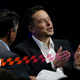Tesla and SpaceX CEO Elon Musk responds to a question by Nevada Republican Gov. Brian Sandoval during the closing plenary session entitled “Introducing the New Chairs Initiative - Ahead” on the third day of the National Governors Association’s meeting Saturday, July 15, 2017, in Providence, R.I. (AP Photo/Stephan Savoia)